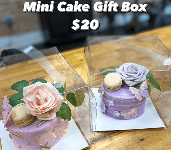 A logo of a cupcake with chocolate frosting.